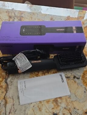 amika Black 2‑in‑1 Heated Straightening Brush with Rose Gold Logo